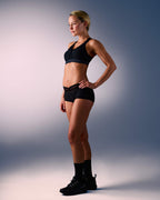 woman wearing hastko seamless sports shorty SHORTY N°19 #color_true-black