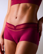 woman wearing hastko seamless sports shorty SHORTY N°19 #color_tuscany-bordeaux