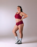 woman wearing hastko seamless sports shorty SHORTY N°19 #color_tuscany-bordeaux