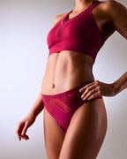 woman wearing a hastko seamless sports tanga TANGA N°23 #color_tuscany-bordeaux