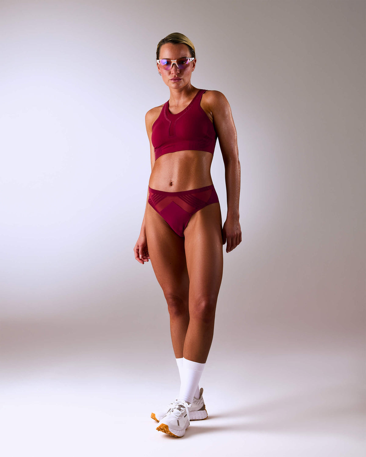 woman wearing a hastko seamless sports tanga TANGA N°23 #color_tuscany-bordeaux
