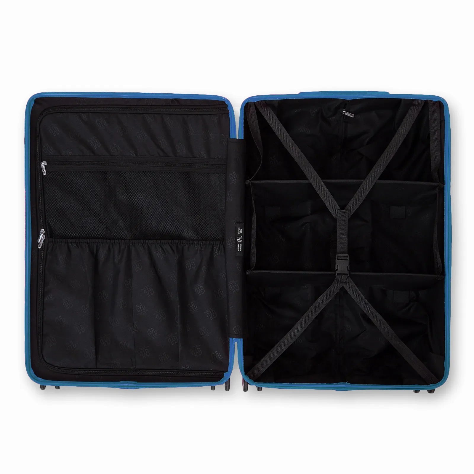 Intérieur compartimenté de la valise GYL Intemporelle bleu grisé avec sangles croisées et poches filet. #couleur_bleu grisé