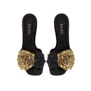 Lavinia Black High-Heel Sandal featuring signature Florette embellishments, combining flamboyance and craftsmanship.