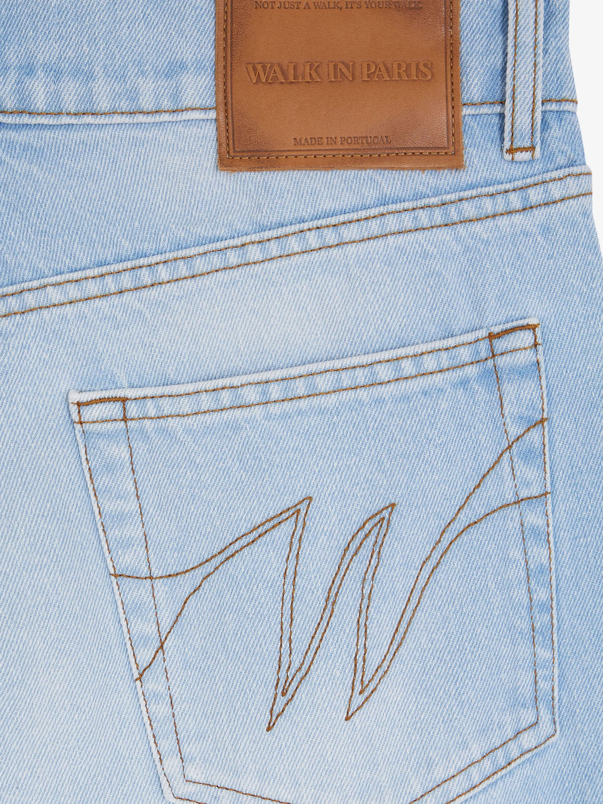 Le Pantalon Regular En Denim Clair Délavé