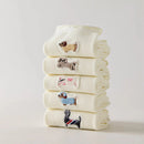 Set de 5 calcetines altos de mujer color crema, bordados con perros o gatos. Diferentes estampados, punto suave y borde enrollado. Talla 35-41. Originales y cómodas.