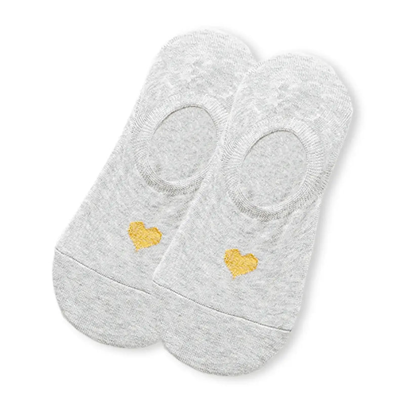Lot de 5 socquettes invisibles cœur doré. Douces, antiglisse, élégantes. Parfaites pour un look discret, confortable et raffiné durant l’été.