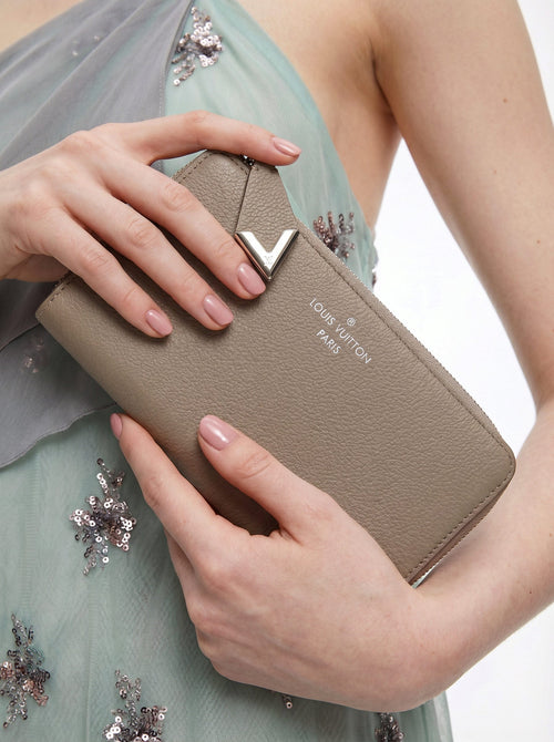 Cartera Louis Vuitton Comète Taurillon Gris pardo