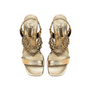 Lyra Gold High-Heel Sandals featuring handwoven embellishments and 90mm stiletto heels, perfect for special occasions.