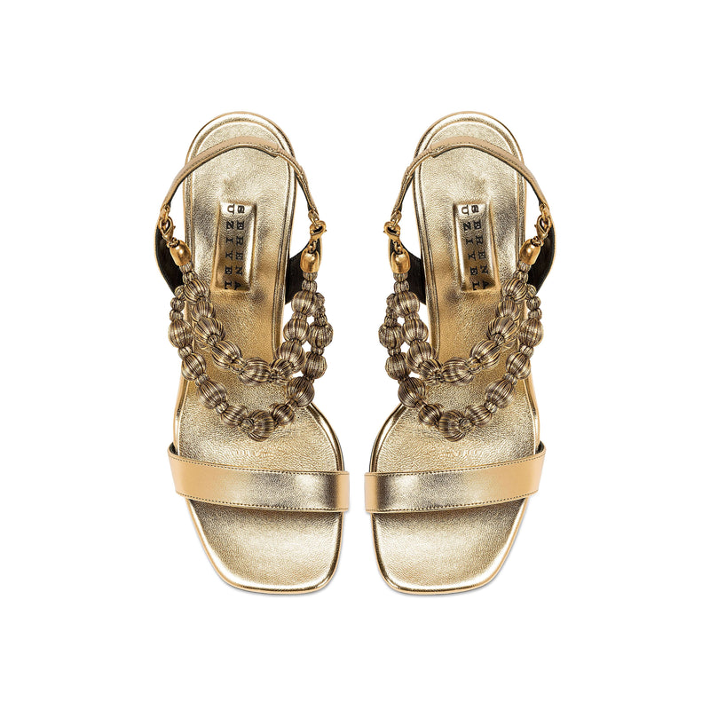 Lyra Gold High-Heel Sandals featuring handwoven embellishments and 90mm stiletto heels, perfect for special occasions.
