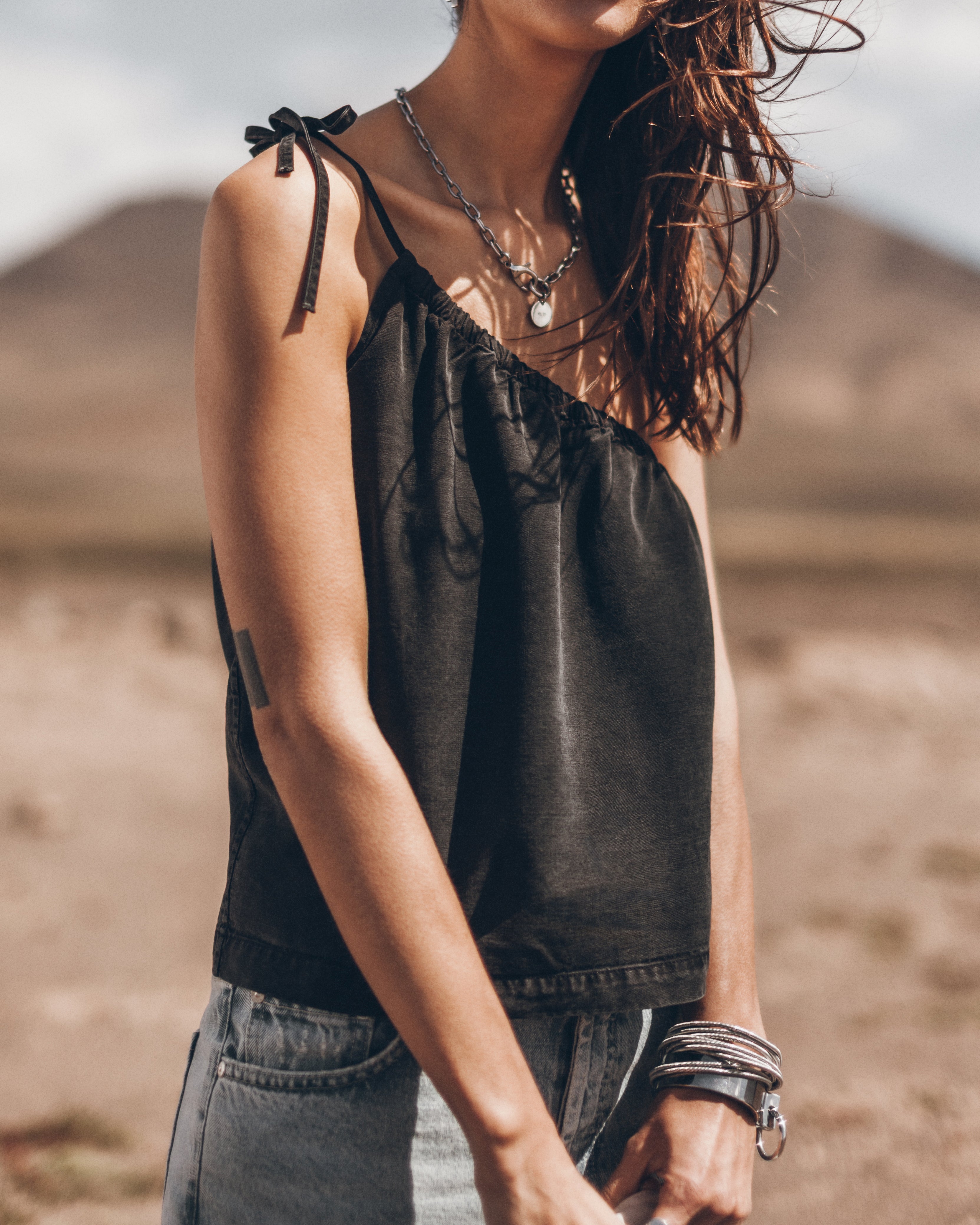 The Black Asymmetrical Top The Blue Straight Slit Jeans The Me Necklace Desert California - Produ...