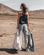 The Black Asymmetrical Top The Blue Straight Slit Jeans The Me Necklace The Light Large Canvas Ba...