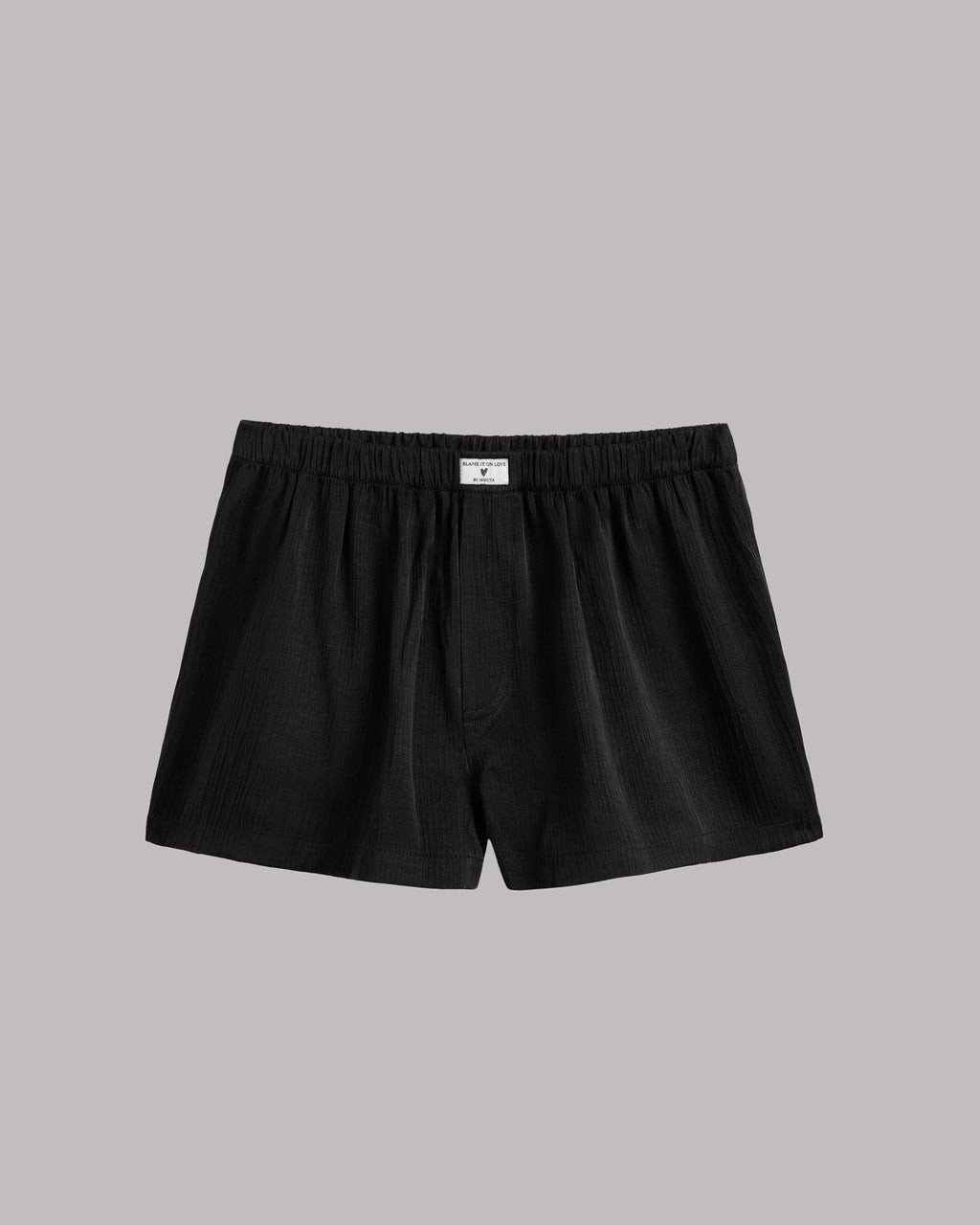 Black crinkle boxer shorts product shot - romantic sleepwear bottoms