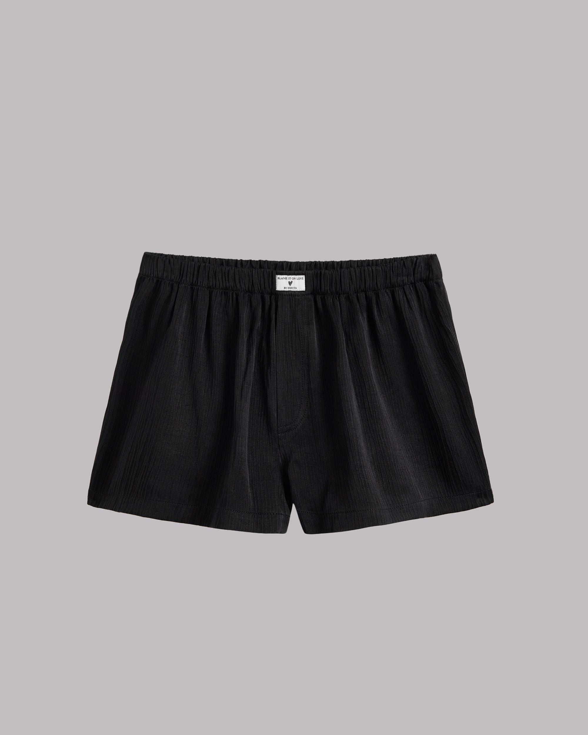 Black crinkle boxer shorts product shot - romantic sleepwear bottoms