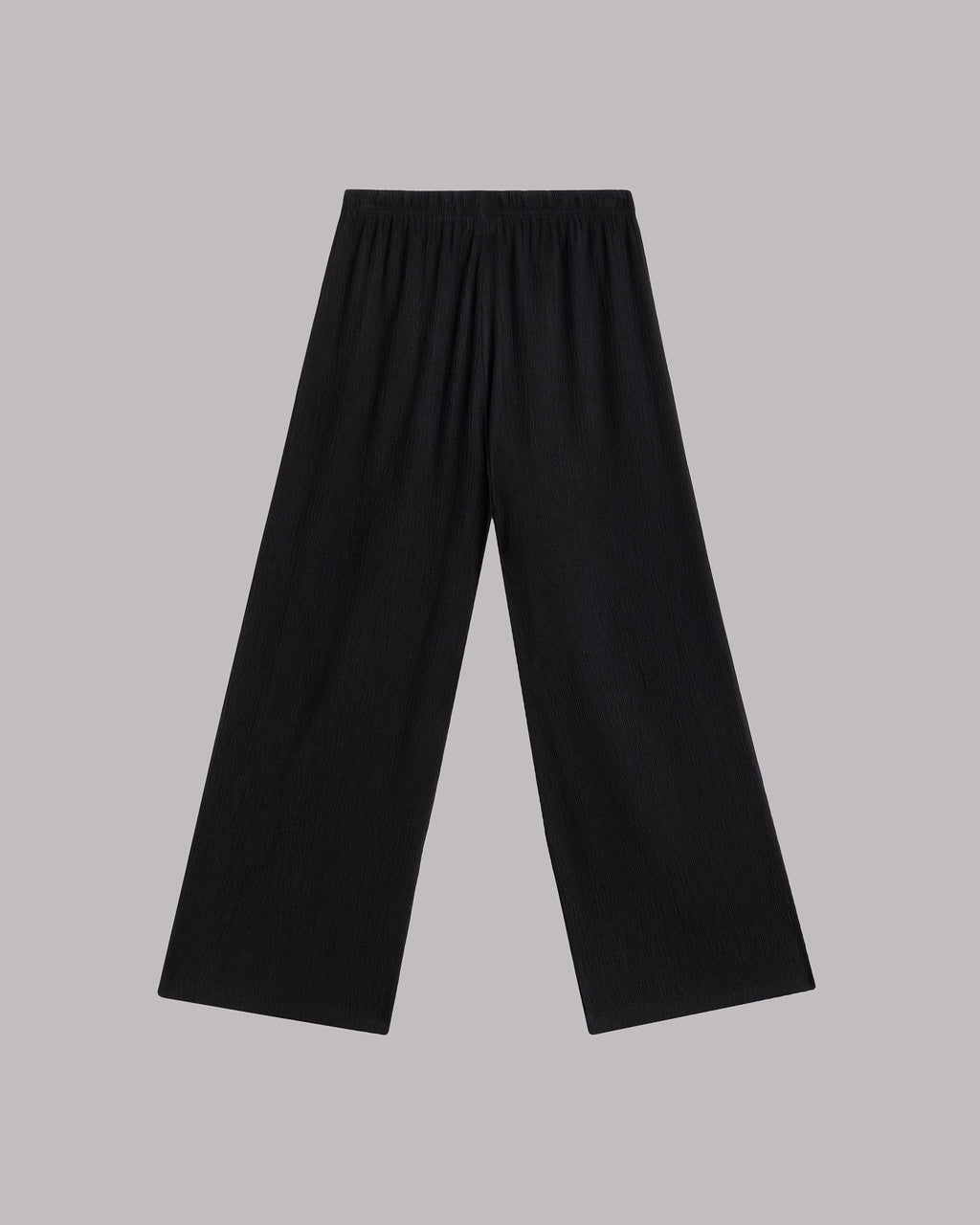Black wide-leg pants on a gray background