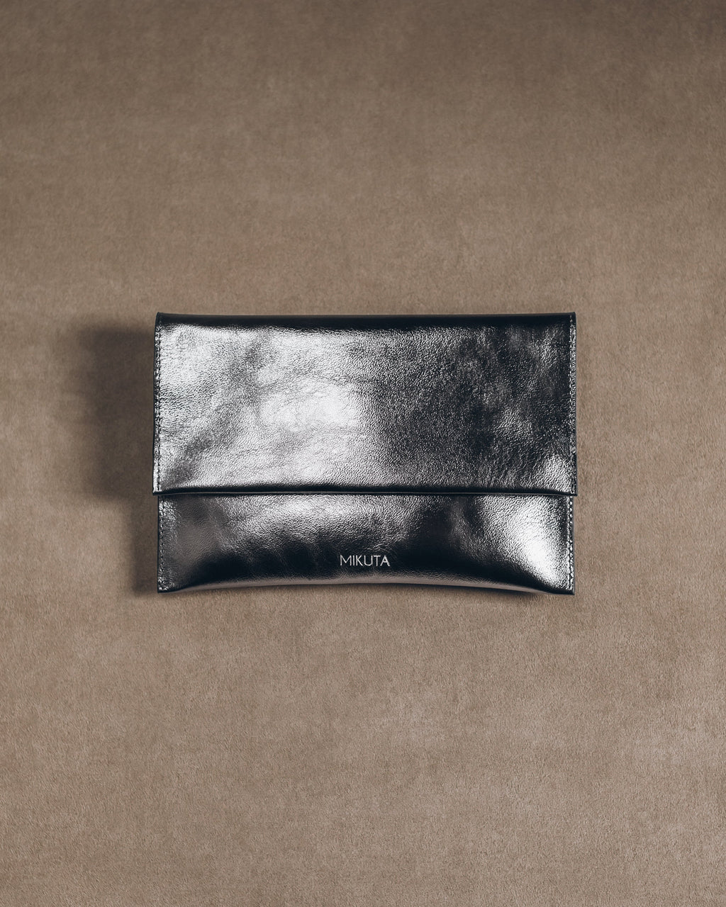 The Silver Leather Essentials Pouch Product Shot - Product photo