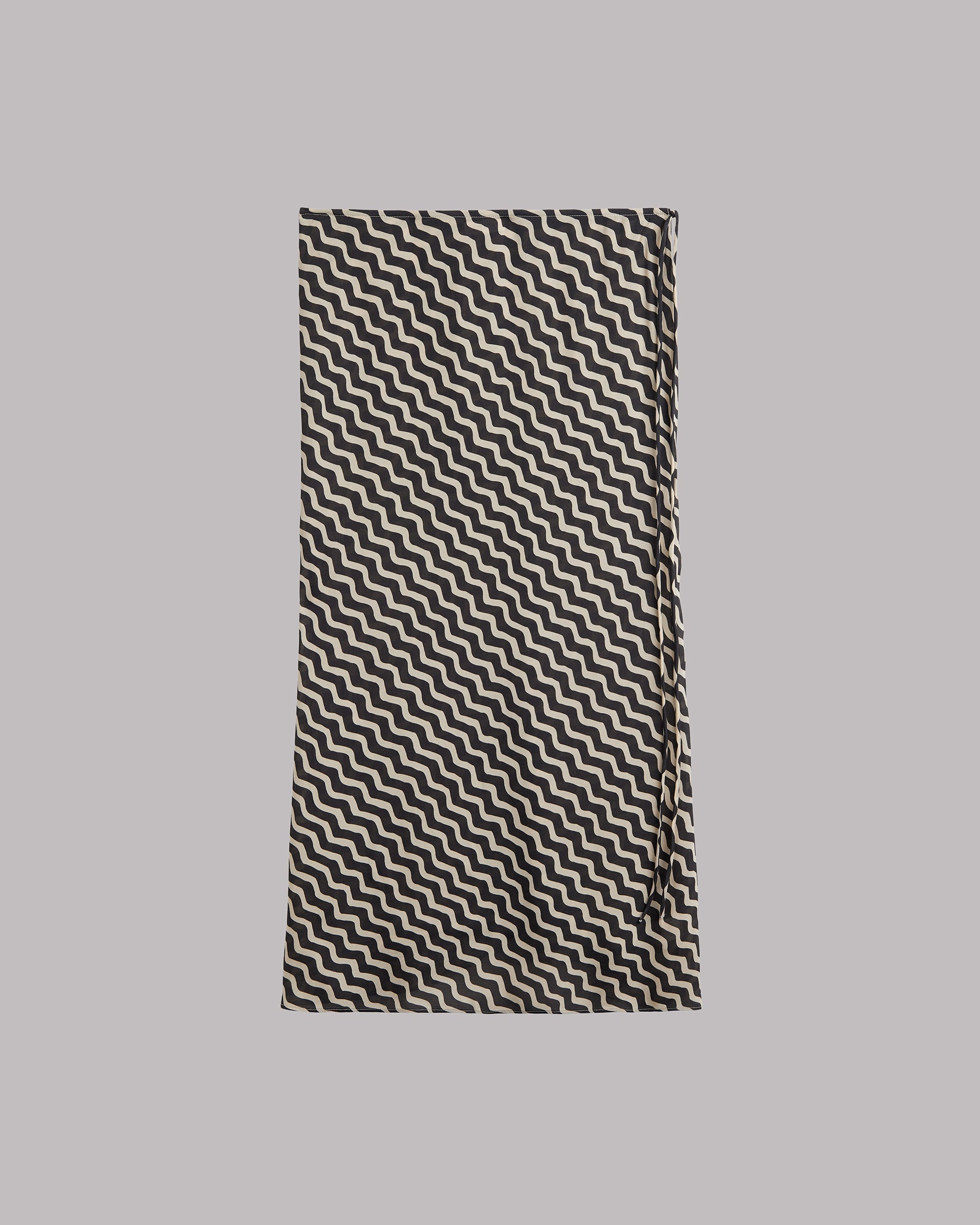 Black and white striped skirt on a gray background
