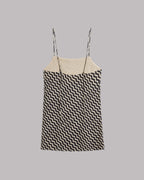 Sleeveless dress with Black and white zigzag pattern on a gray background