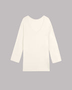 White long-sleeve top on a gray background.