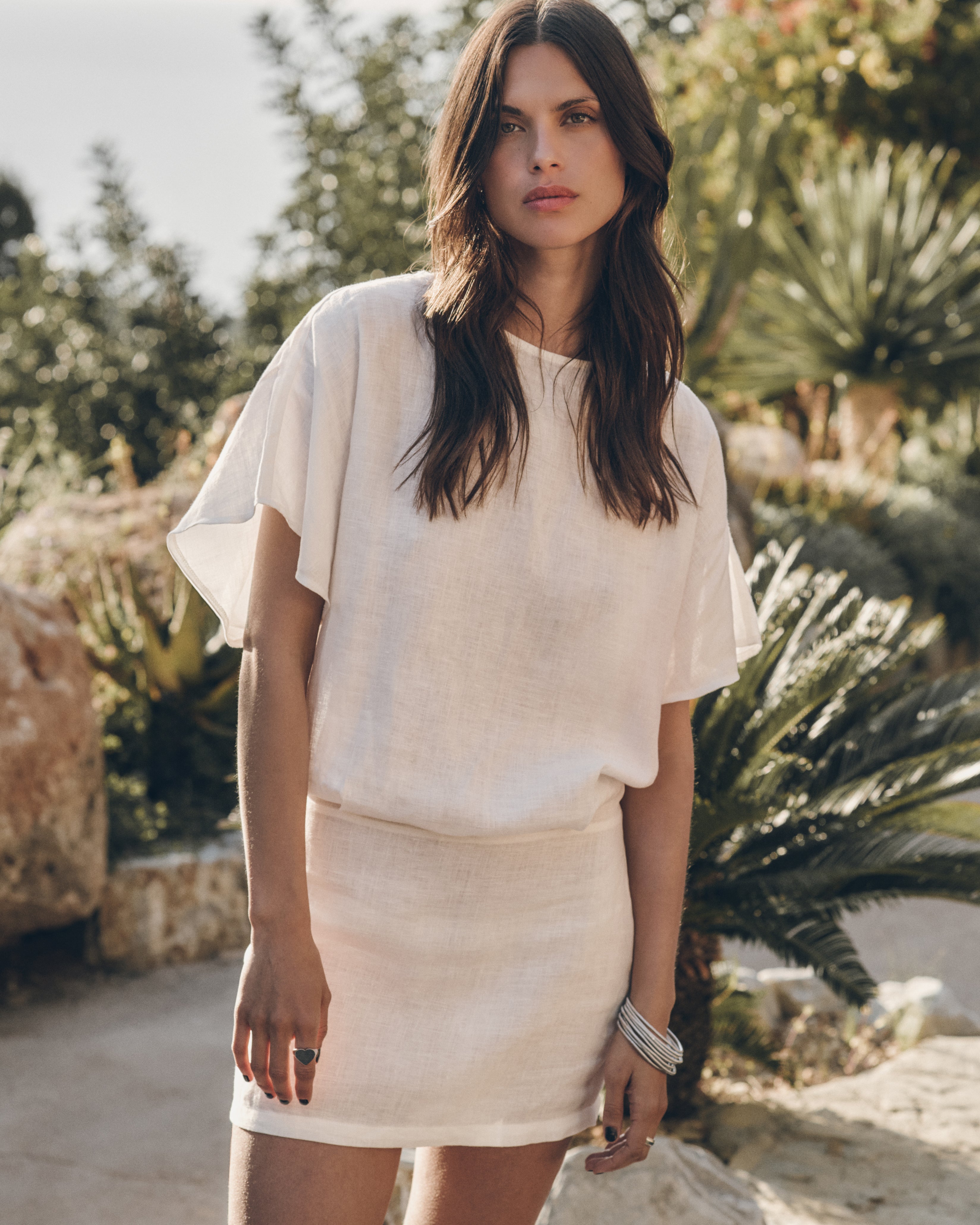 The White Short Linen Bat Dress The Black Thin Studded Leather Sandals - Product photo