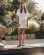 The White Short Linen Bat Dress The Black Thin Studded Leather Sandals - Product photo