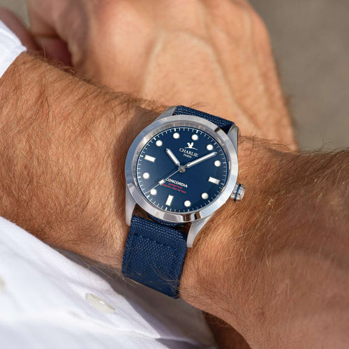 Close-up of the wrist of a Man wearing the Concordia waterproof quartz watch for Man with blue dial.
