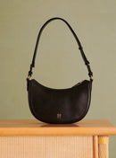 BOLSO SAULA MEDIA LUNA DE PIEL PETITE MENDIGOTE