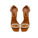 Naria Camello Platform Ankle Sandal in tan leather with ornate oval embellishment and 120 mm platform.