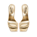 Naria Gold High-Heel Sandal featuring elegant gold leather and intricate oval embellishments.