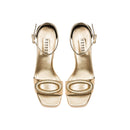 Naria Gold Platform Ankle Sandal with embroidered oval embellishment, crafted from golden Italian leather.