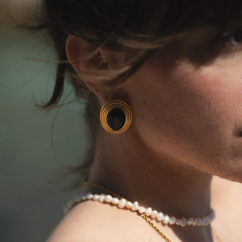 Pendientes de dinero viejo