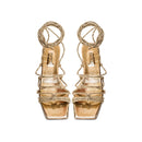 Ophilia Gold Flat Lace-Up Sandal in antique gold leather with braided straps for elegance and style.