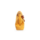 Petra Mustard pouch bag showcasing its stylish design and unique rope handle from a side view.