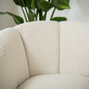 Fauteuil pivotant Ysé en tissu bouclé blanc