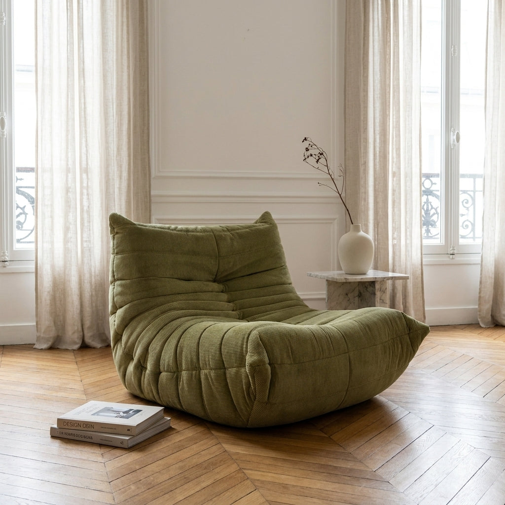 Sillón Togo de terciopelo verde acanalado