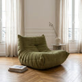 Sillón Togo de terciopelo verde acanalado