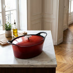 Volcan - Cocotte Ovale Fonte Avec Couvercle - 2 Tailles - Rouge