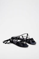 Sandalias de piel de oveja - Negro