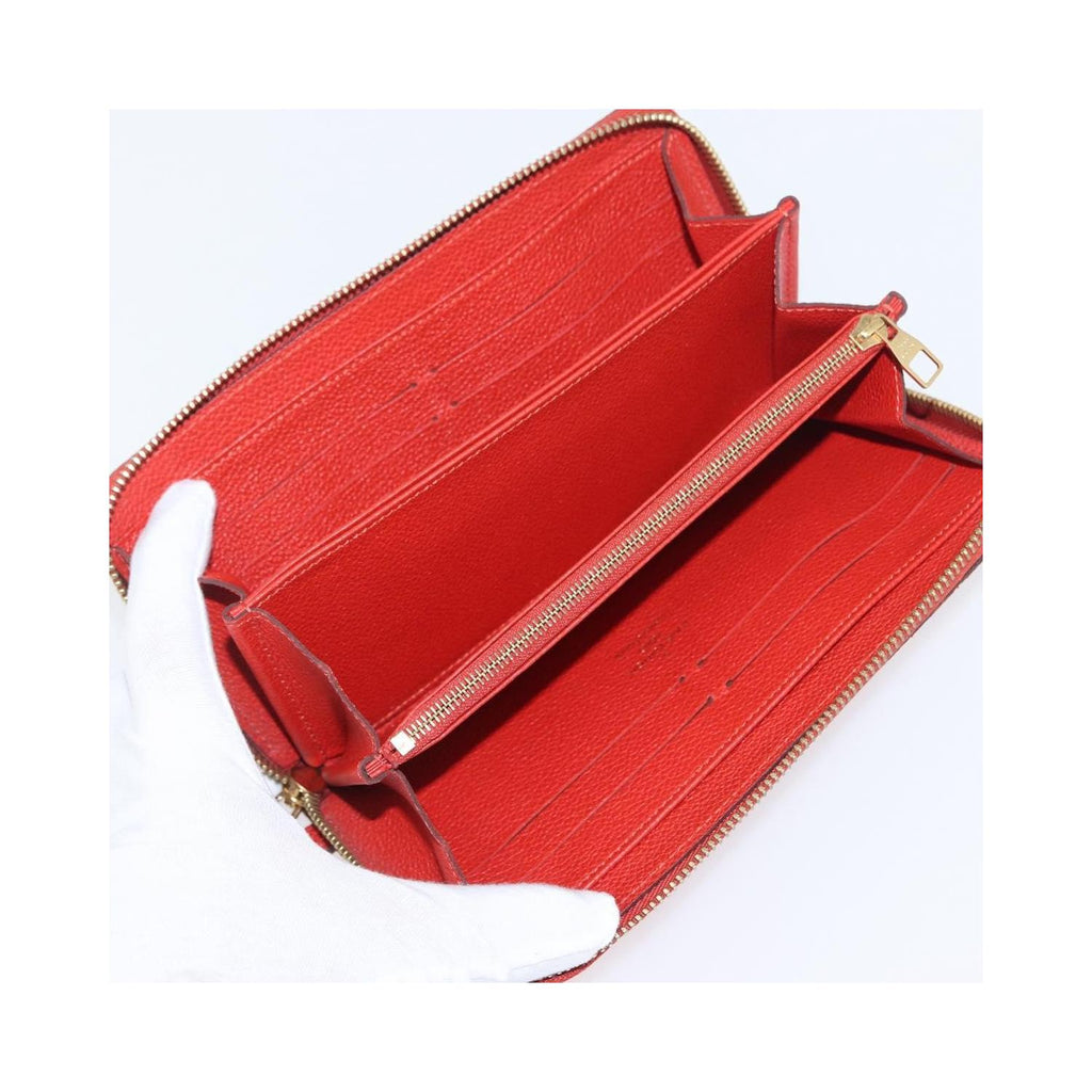 Portefeuille Louis Vuitton Portefeuille Zippy Monogramme Empreinte Cuir - Orange