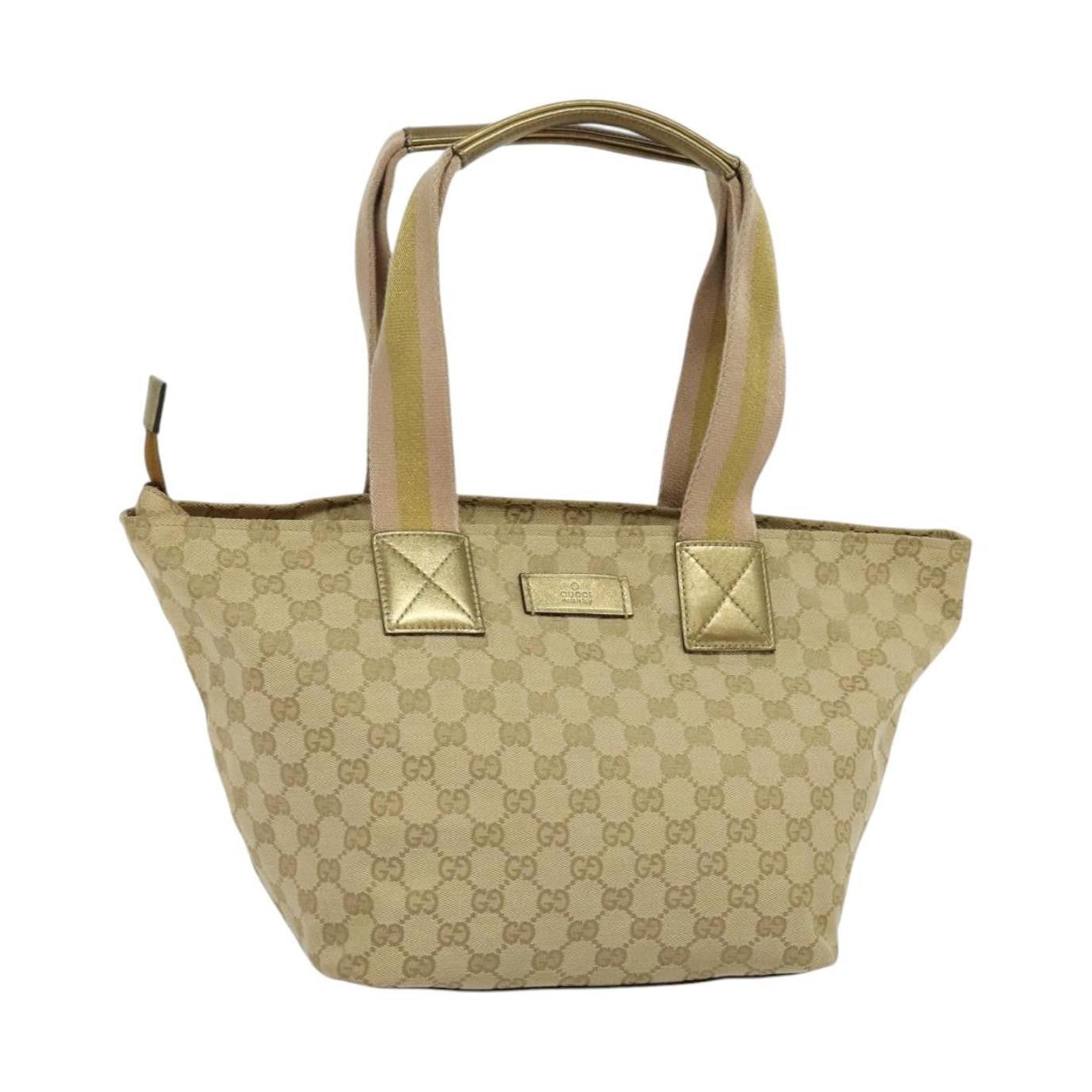 Bolso tote con cremallera y web Gucci GG Canvas mediano