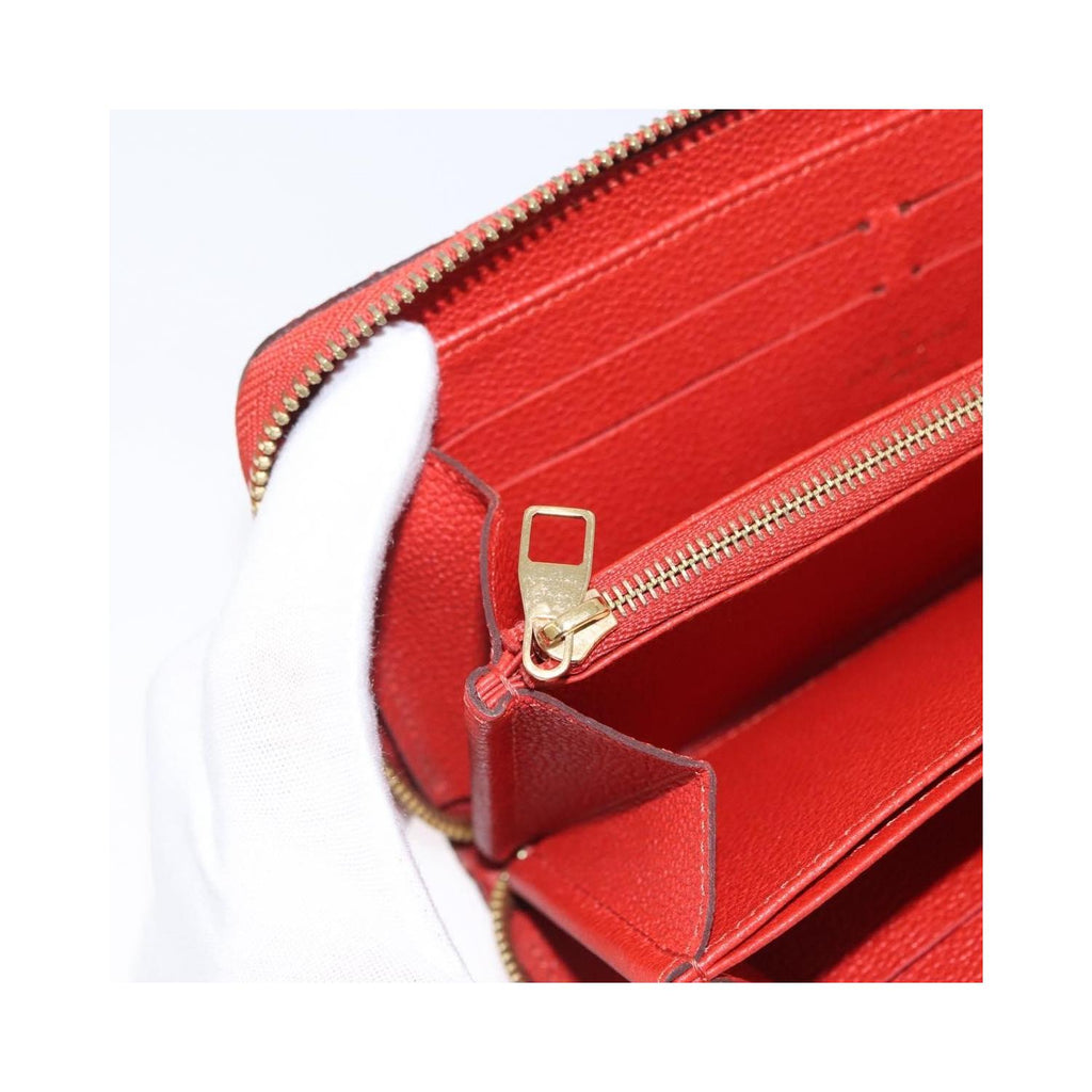 Portefeuille Louis Vuitton Portefeuille Zippy Monogramme Empreinte Cuir - Orange