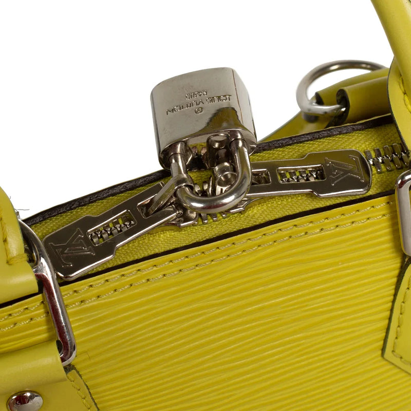 sac de seconde main alma louis vuitton  en cuir épi jaune défaut 3