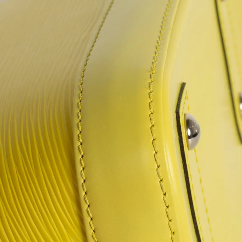 sac de seconde main alma louis vuitton  en cuir épi jaune coin 1