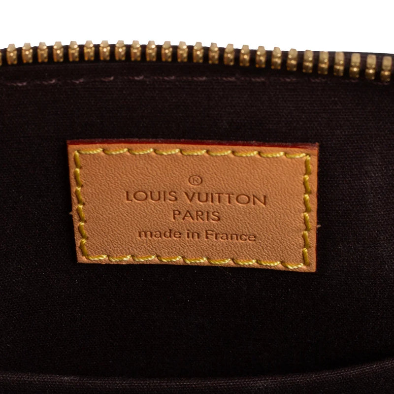 sac de seconde main alma louis vuitton en cuir verni violet label