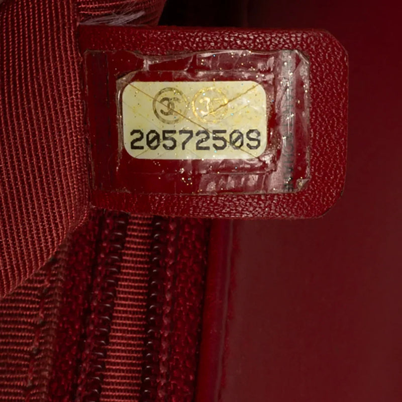 sac de seconde main boy chanel  en cuir rouge numéro de série