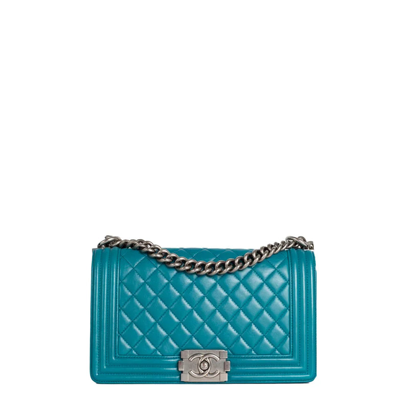 sac de seconde main boy chanel  en cuir bleu face