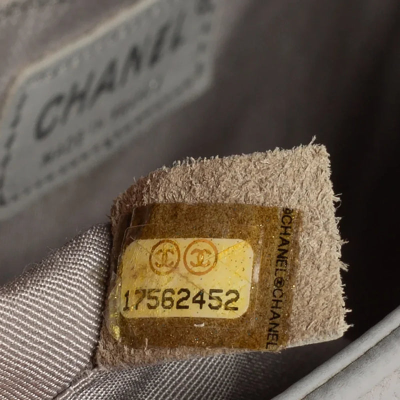 sac de seconde main boy chanel  en cuir gris  numéro de série