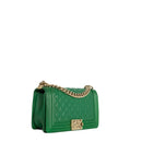 sac de seconde main boy chanel  en cuir vert côté