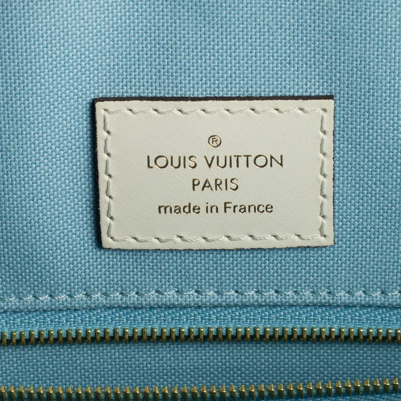 sac de seconde main on the go  louis vuitton  en cuir empreinte bleu  label