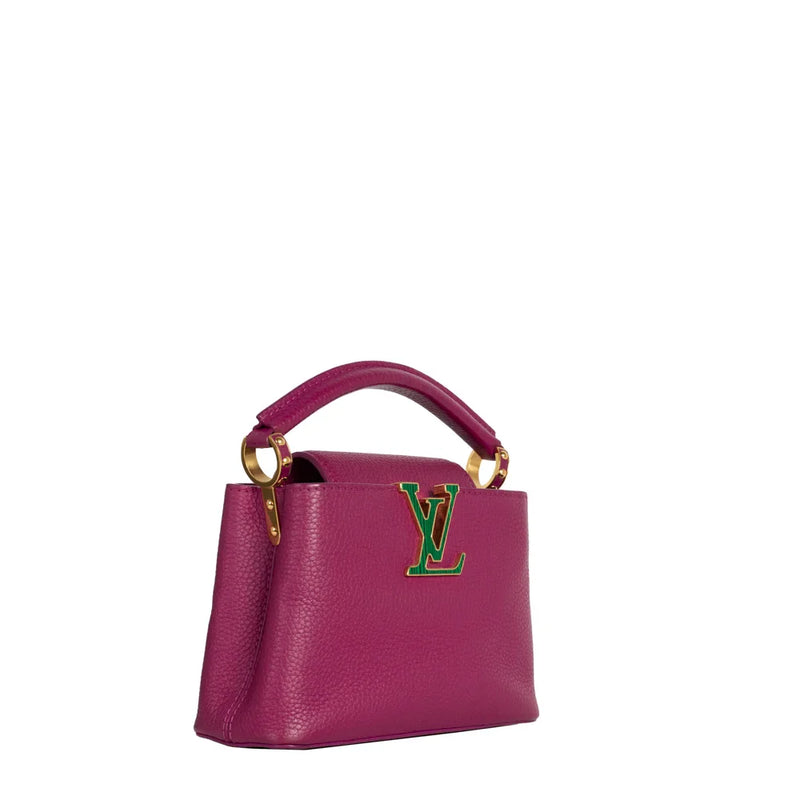 sac de seconde main capucines  louis vuitton  en cuir violet côté