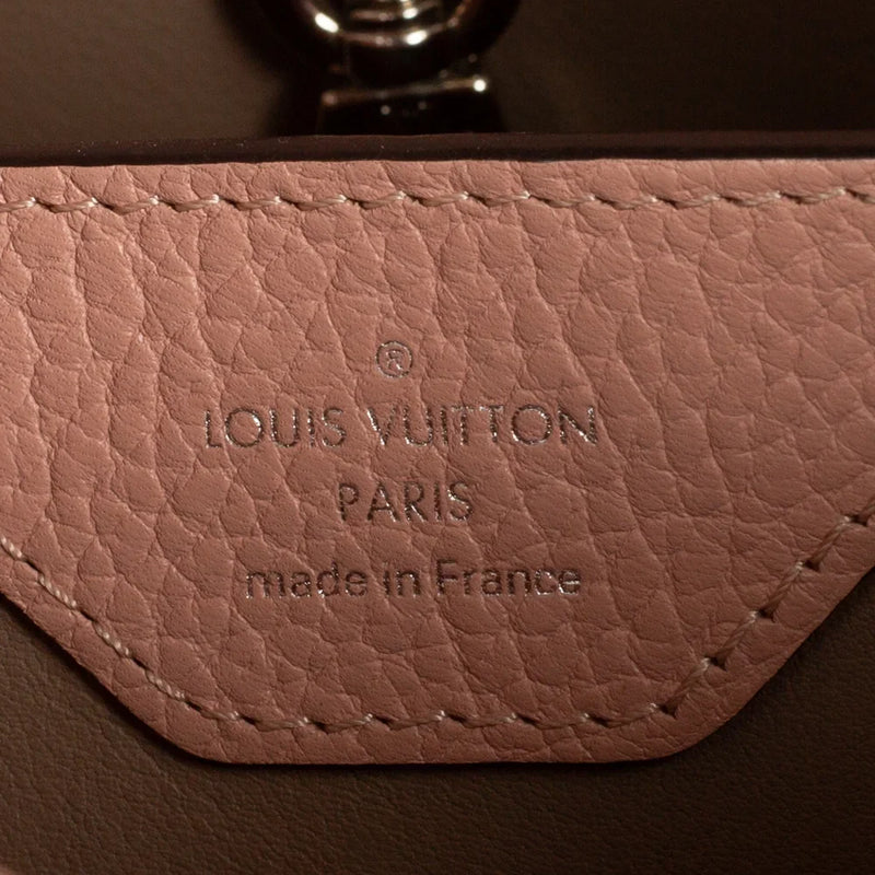 sac de seconde main capucines louis vuitton en cuir rose  label